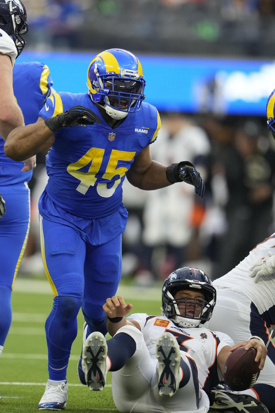 Los Angeles Rams linebacker Bobby Wagner celebrates after sacking Denver Broncos quarterback Russell Wilson during the first half of an NFL football game between the Los Angeles Rams and the Denver Broncos on Sunday, Dec. 25, 2022, in Inglewood, Calif. (AP Photo/Marcio J. Sanchez)