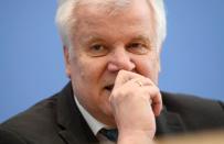 German Interior Minister Horst Seehofer attends a news conference, in Berlin
