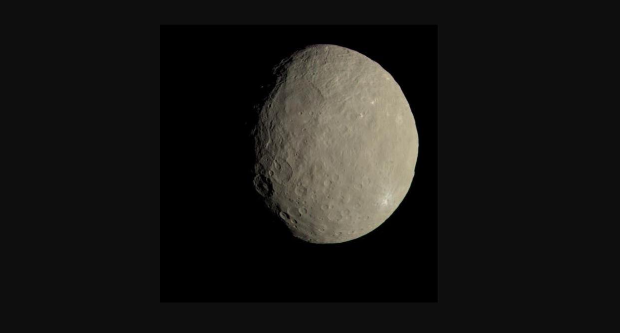  This image of the dwarf planet Ceres, taken by NASA's Dawn spacecraft in 2015, approximates how the dwarf planet's colors would appear to the eye. 