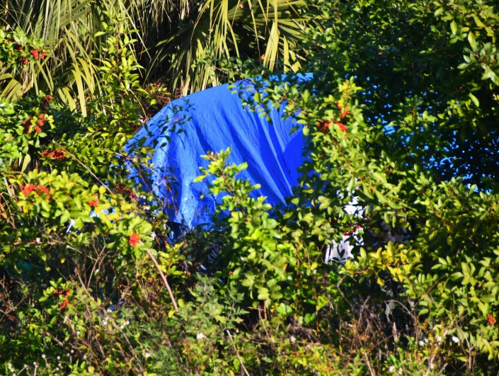 Residents of a homeless camp off of 192 near Melbourne are facing a tough problem. They are being evicted from the property but the camp is their official address and can&#39;t leave the property or they will be violating their probation. Many wear ankle bracelets or have GPS monitors.