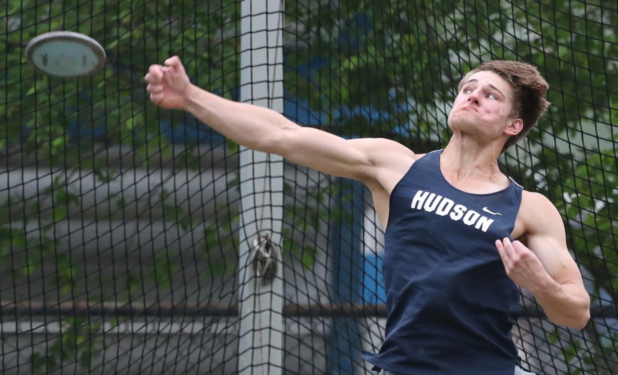 Hudson's Benjamin Shabino throws the discus during the Suburban League National Conference track at Twinsburg High School on Tuesday, May 7, 2024.