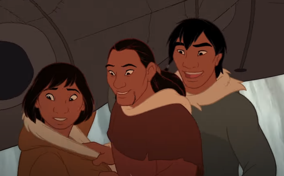 a family smiling and looking off to the left
