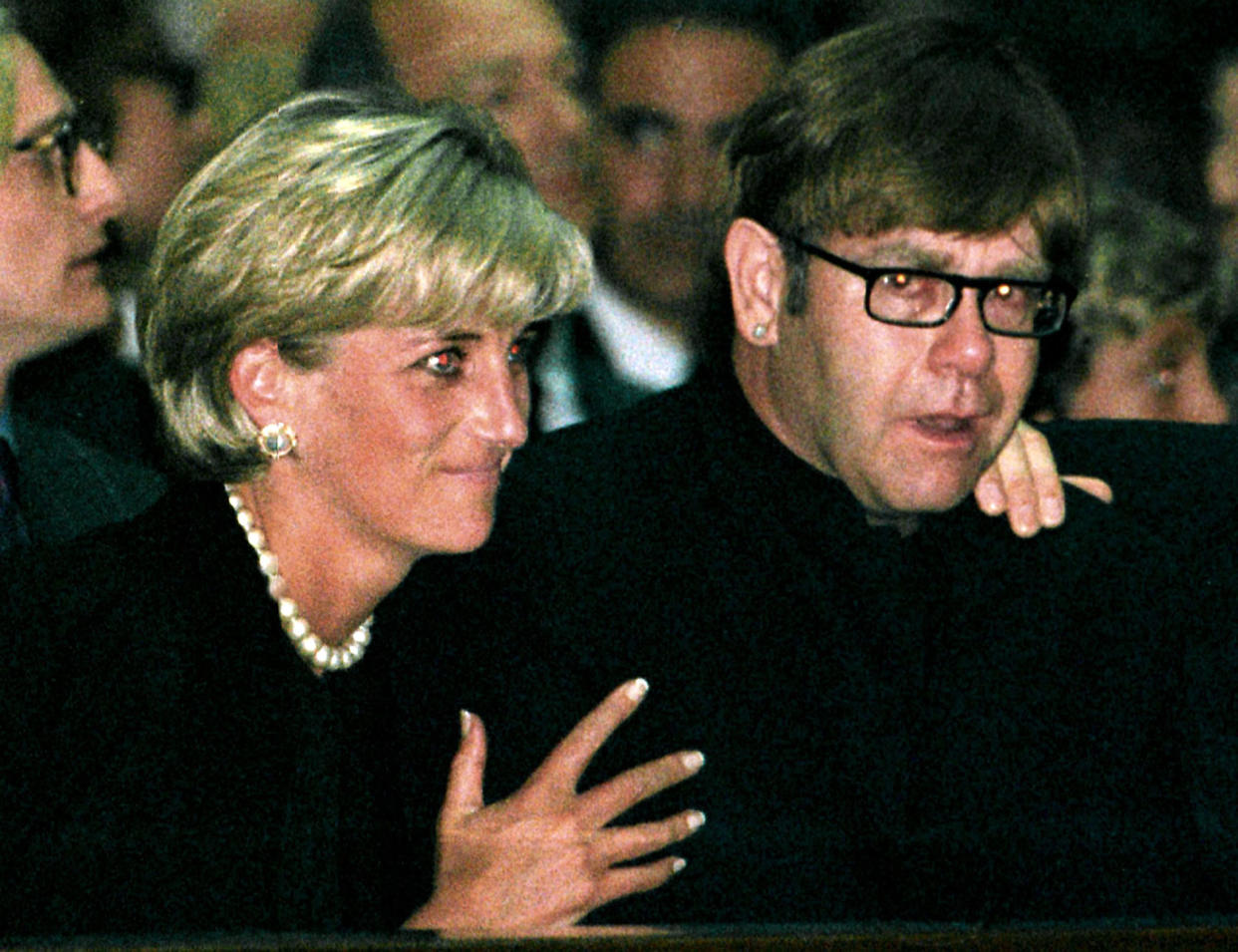 FILE PHOTO 22JUL97 - Diana, Princess of Wales and pop star Elton John attend a memorial mass for Italian fashion designer Gianni Versace in Milan Cathedral July 22. Rock superstar Elton John will sing at her funeral on Saturday before a worldwide television audience expected to run into hundreds of millions. Elton John said in a television interview that he will do all he can not to cry when he performs at the funeral of his friend Diana.

DIANA ELTON