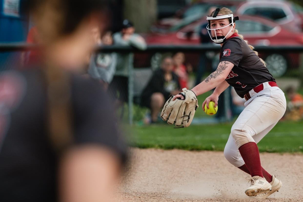 Dover's Lainey Kohler fields a grounder from New Philadelphia, Friday, April 26 at Tuscora Park in New Philadelphia.