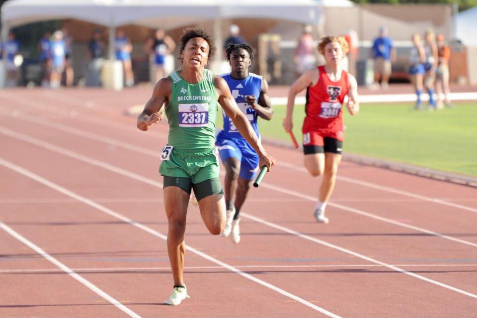 Breckenridge's Sean Cooksey runs in the 800 relay at the state track and field meet.