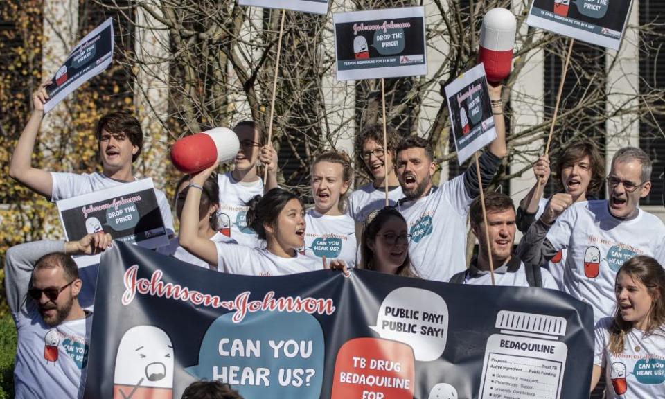 Demonstrators rally to lower the price of a tuberculosis drug outside the Johnson & Johnson campus in Zug, Switzerland, on 17 October.