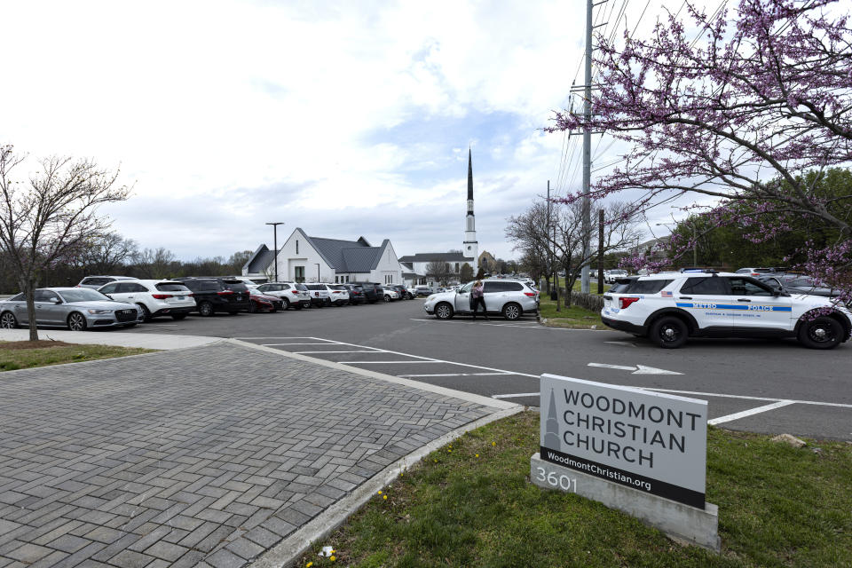 Cars pack the parking lot for a funeral service held for The Covenant School shooting victim Evelyn Dieckhaus at the Woodmont Christian Church Friday, March 31, 2023, in Nashville, Tenn. (AP Photo/Wade Payne)