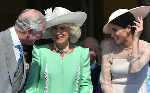 Prince Charles, with wife Camilla, the Duchess of Cornwal, and the Duchess of Sussex - Credit: PA