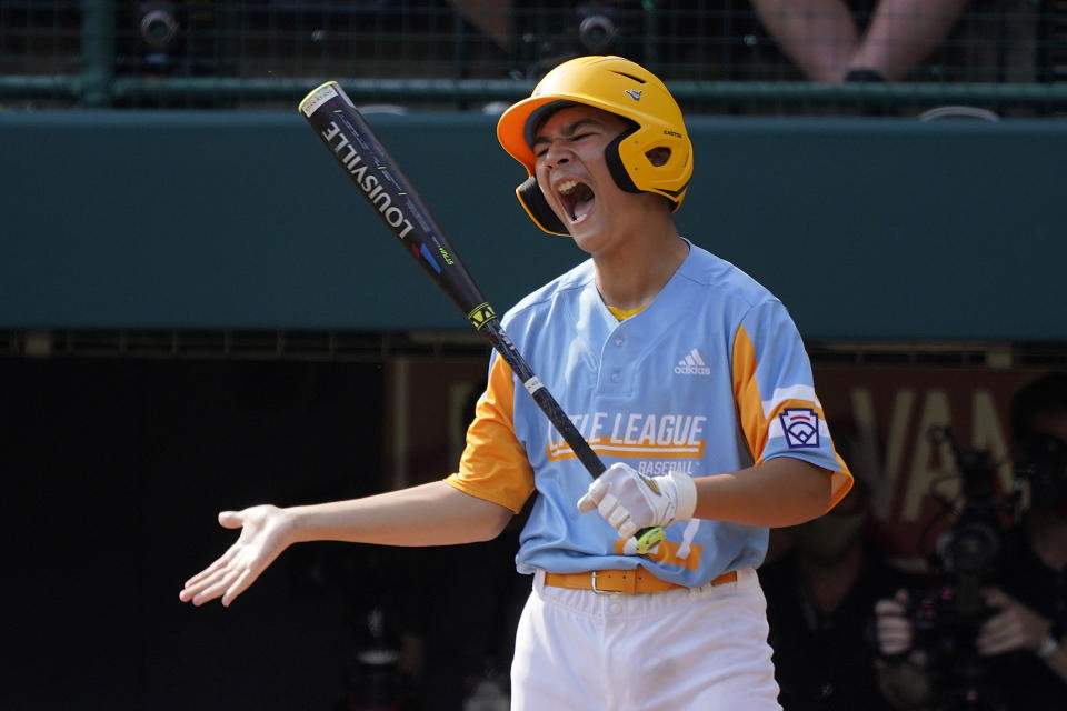 Honolulu, Hawaii's Ryan Keanu reacts to swinging at a third strike from Taylor, Mich., starting Cameron Thorning to end the third inning of a baseball game at the Little League World Series in South Williamsport, Pa., Saturday, Aug. 28, 2021. (AP Photo/Gene J. Puskar)