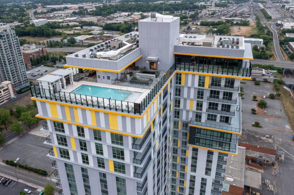 The Ellis’ rooftop deck includes a pool.