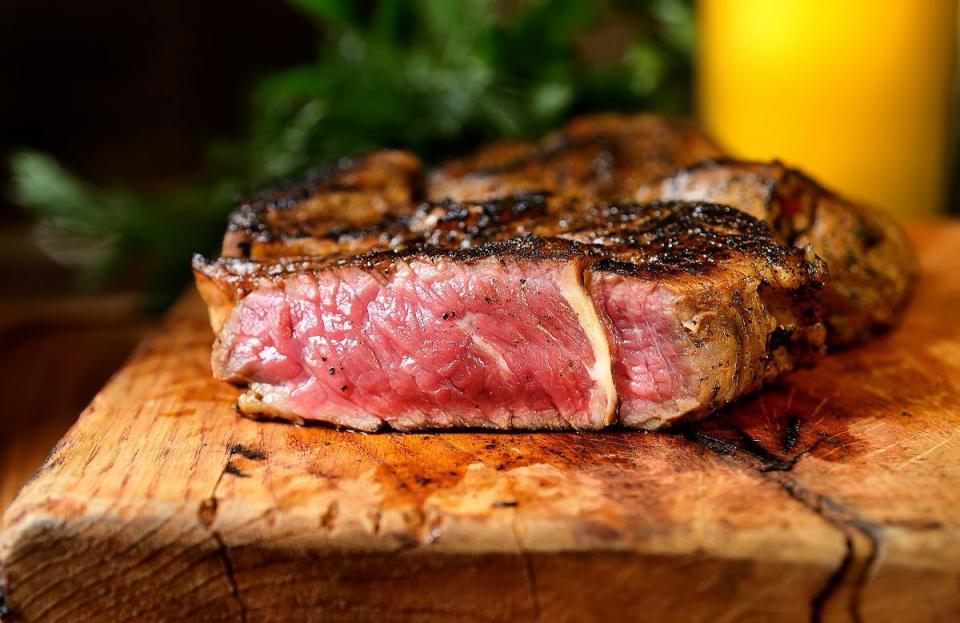 <p>For a hearty steak, perfect to <a href="https://www.thedailymeal.com/drink/beer-facts-questions-answered?referrer=yahoo&category=beauty_food&include_utm=1&utm_medium=referral&utm_source=yahoo&utm_campaign=feed" rel="nofollow noopener" target="_blank" data-ylk="slk:pair with a refreshing beer;elm:context_link;itc:0;sec:content-canvas" class="link ">pair with a refreshing beer</a>, you’re likely going to want to cook it rare. To achieve a cool red center while maintaining safety, the temperature of the steak should be 125 degrees Fahrenheit. Note that the <a href="https://www.foodsafety.gov/food-safety-charts/safe-minimum-cooking-temperature?referrer=yahoo&category=beauty_food&include_utm=1&utm_medium=referral&utm_source=yahoo&utm_campaign=feed" rel="nofollow noopener" target="_blank" data-ylk="slk:CDC recommends;elm:context_link;itc:0;sec:content-canvas" class="link ">CDC recommends</a> a conservative minimum internal temperature of 145 degrees Fahrenheit for steaks cooked at home, so anything below that is at your own risk.</p>