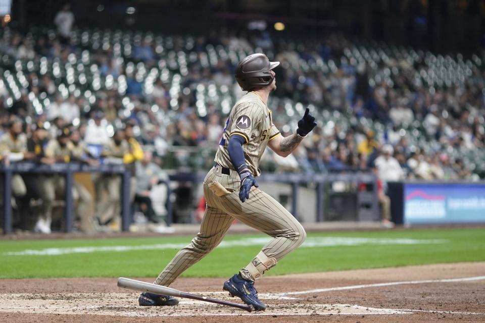 San Diego Padres' Jackson Merrill hits a two-run scoring single during the fifth inning of a baseball game against the Milwaukee Brewers Monday, April 15, 2024, in Milwaukee. (AP Photo/Morry Gash)