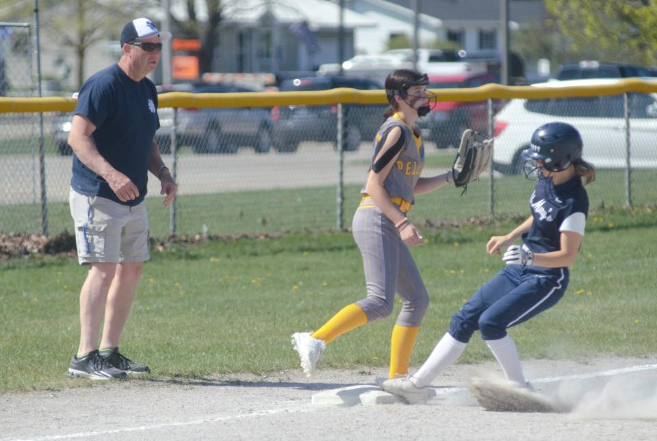 Kaylee Jeffers pulls into third base during a high school softball matchup between Gaylord St. Mary and Pellston on Thursday, May 11.