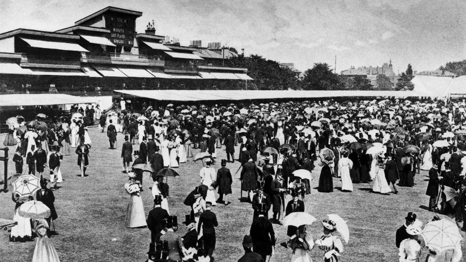 Spectators at Lord's Cricket Ground during the lunch interval in 1895 at the annual Eton vs. Harrow match. - Symons & Thiele/Hulton Archive/Getty Images