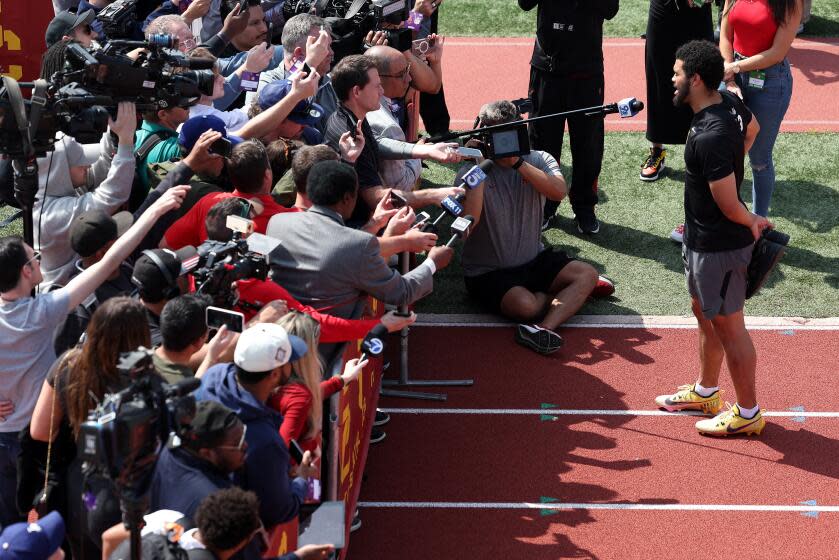 USC quarterback Caleb Williams talks during USC pro day Wednesday.