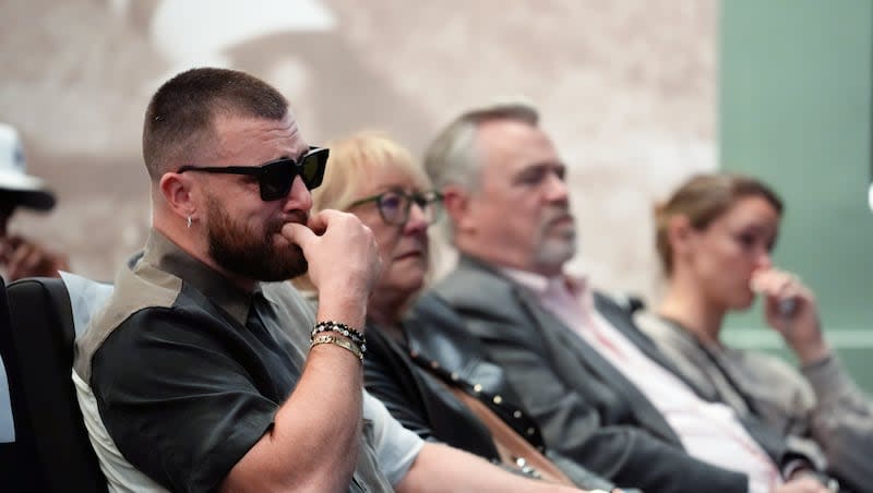 Philadelphia Eagles' Jason Kelce's family, from left, Kansas City Chiefs' Travis Kelce; mother, Donna Kelce; father, Ed Kelce; and wife, Kylie McDevitt Kelce, listens as Jason Kelce announces his retirement at an NFL football press conference in Philadelphia, Monday, March 4, 2024.