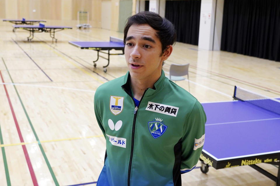 Brazil's Hugo Calderano speaks after a WTT tournament table tennis match, Sunday, Feb. 12, 2023, in Kawasaki, near Tokyo. Calderano is No. 5 in the sport’s ranking, he reached No. 3 a year ago, and he's defeated many of the top Chinese including No. 1 Fan Zhendong. (AP Photo/Eugene Hoshiko)