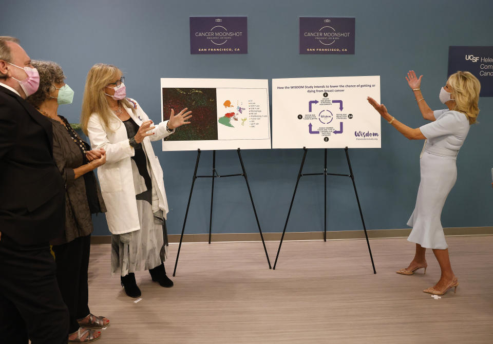 First lady Jill Biden, right, gestures while meeting with Dr. Alan Ashworth, from left, cancer patient Penny Marienthal, and Dr. Laura Esserman during a visit to the University of California San Francisco Helen Diller Family Comprehensive Cancer Center in San Francisco, Friday, Oct. 7, 2022. (John G. Mabanglo/Pool Photo via AP)