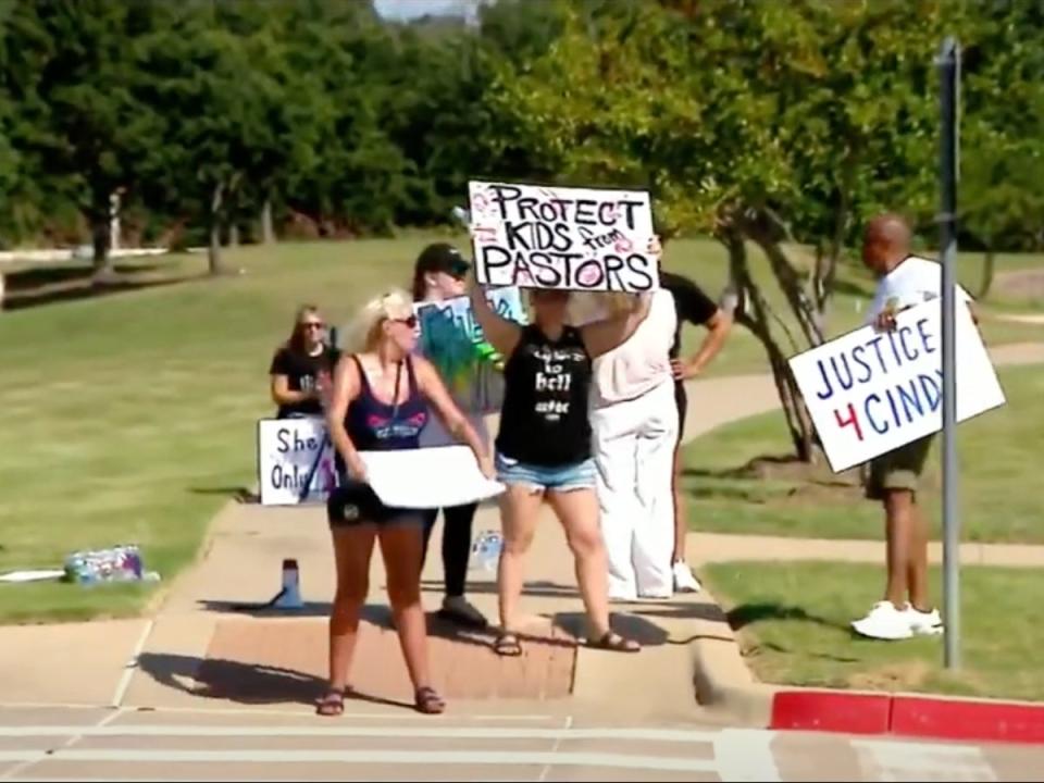 A group of protesters outside Gateway Church in Southlake, Texas, calling for pastor Robert Morris to step down last week (screengrab/CBS Texas)