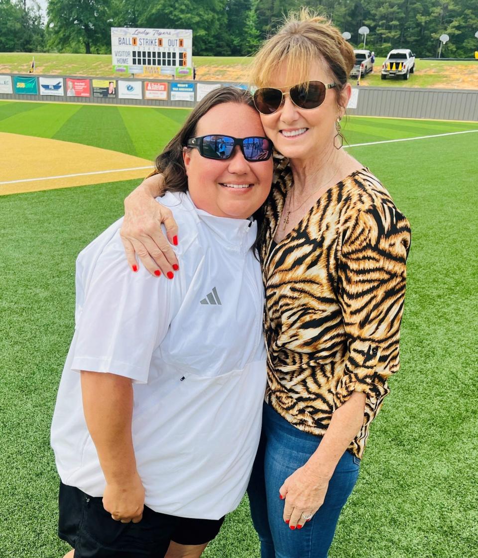 Logansport's Jen Wheless hugs longtime friend and former North DeSoto coach Lori McFerren after a recent LHSAA playoff game.