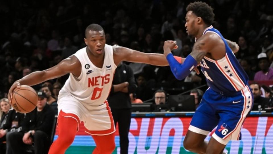 Brooklyn Nets forward RaiQuan Gray (0) tries to get past Philadelphia 76ers center Dewayne Dedmon (14) during the fourth quarter at Barclays Center