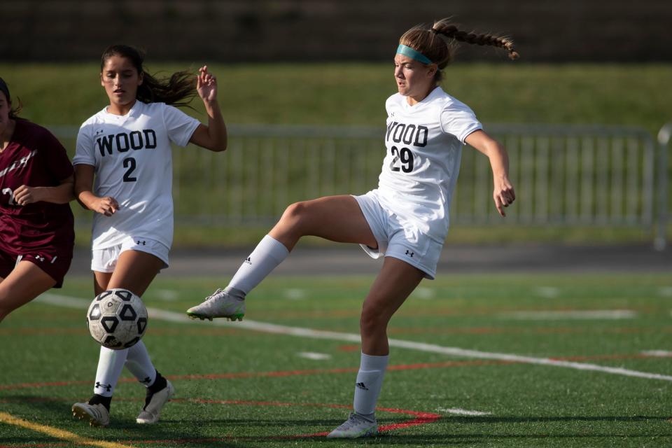 Archbishop Wood's Paige Eckert battles for the ball at Monsignor Bonner and Archbishop Prendergast Catholic High School in Drexel Hill on Monday, Sept. 26, 2022. The Vikings won 11-0. 