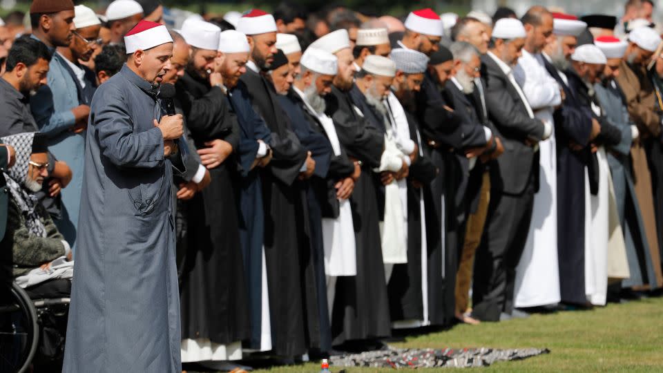 Imam Gamal Fouda leads Friday prayer at Hagley Park in Christchurch, New Zealand, on March 22, 2019, the week after a mass shooting at two mosques left 51 people dead. - Vincent Thian/AP