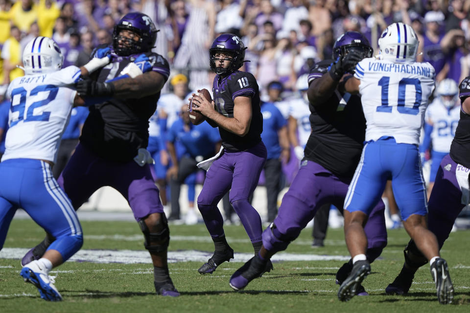 TCU quarterback Josh Hoover (10) looks to pass during the first half of an NCAA college football game against BYU, Saturday, Oct. 14, 2023, in Fort Worth, Texas. (AP Photo/LM Otero)