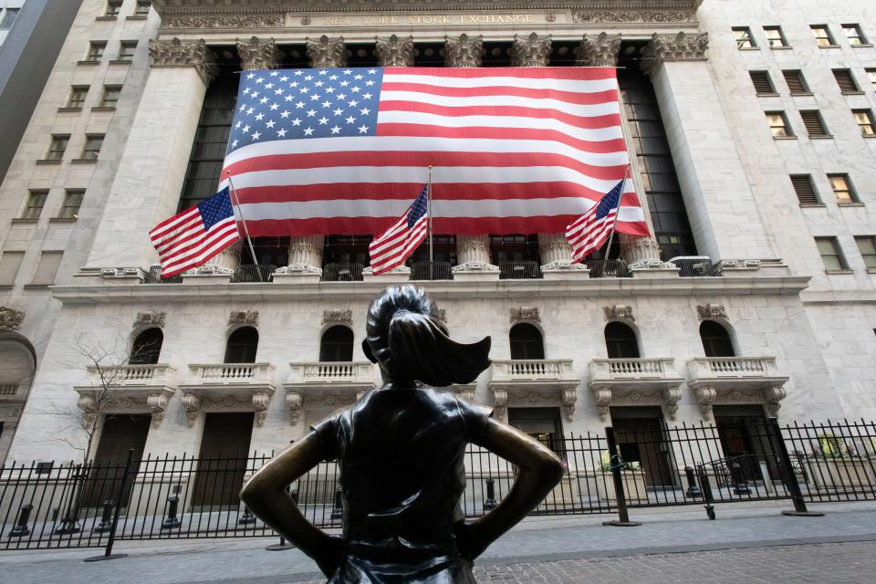 The "Fearless Girl" statue stands in front of the New York Stock Exchange on March 16, 2020.