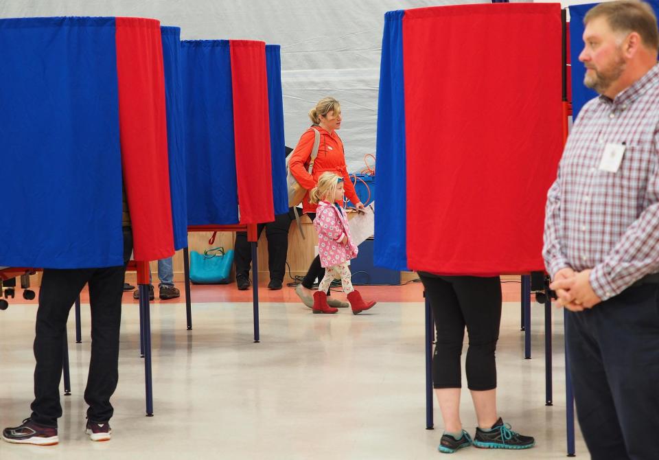 Voters cast their ballots at the Ward 4 polls in Portsmouth during a past election.