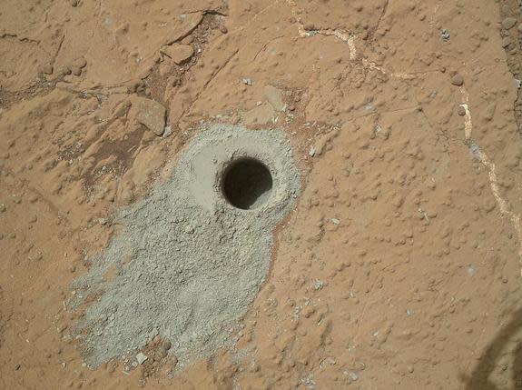 NASA's Mars rover Curiosity drilled into this rock target, "Cumberland," on May 19, 2013, collecting a powdered sample of material from the rock's interior. Analysis of the Cumberland sample will check results from "John Klein," the first rock