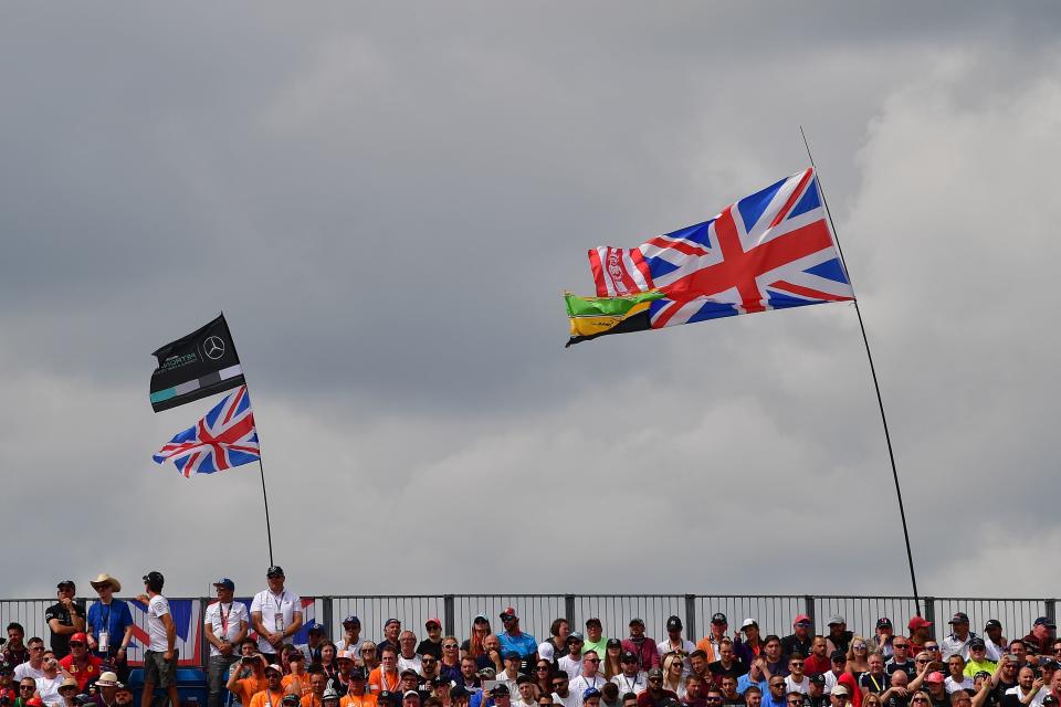 British Union flags flutter in the breeze above the grandstand during the British Formula One Grand Prix at the Silverstone motor racing circuit in Silverstone, central England, on July 14, 2019. (Photo by Andrej ISAKOVIC / AFP)        (Photo credit should read ANDREJ ISAKOVIC/AFP/Getty Images)