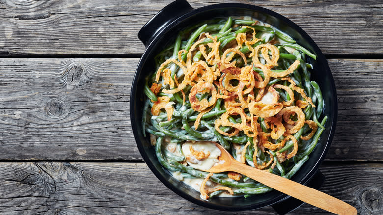 Green bean casserole wooden background