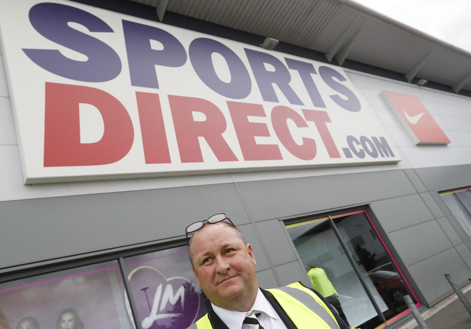 Mike Ashley (C), founder and majority shareholder of sportwear retailer Sports Direct, leads journalists on a factory tour after the company's AGM, at the company's headquarters in Shirebrook, Britain, September 7, 2016. REUTERS/Darren Staples 