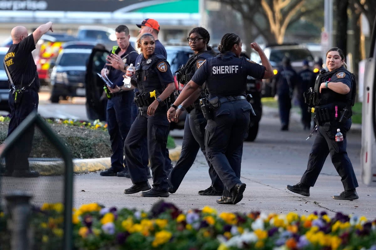 Police on the scene of the Lakewood Church shooting  (© 2024 Karen Warren / Staff photographer)