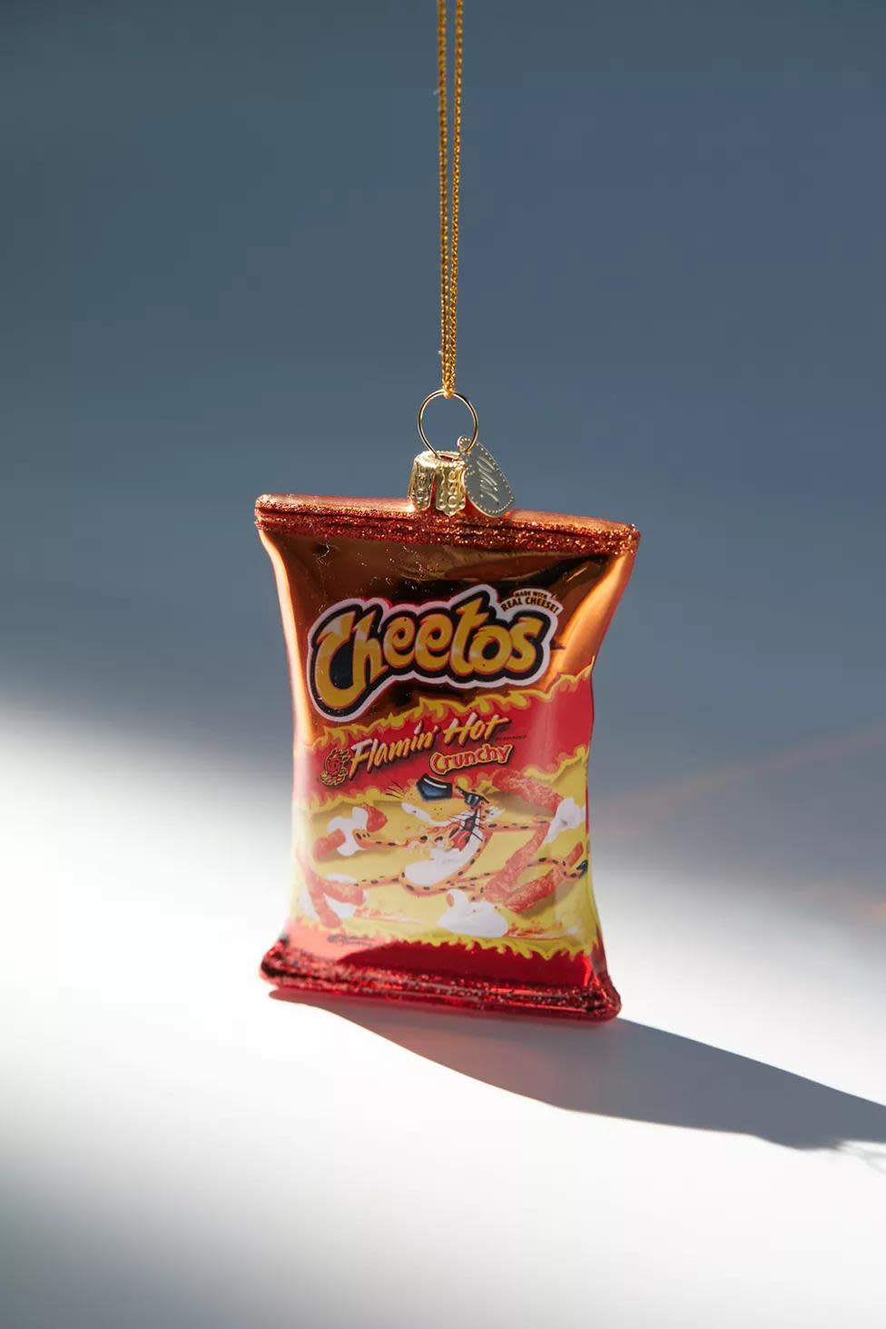 <p><a href="https://go.redirectingat.com?id=74968X1596630&url=https%3A%2F%2Fwww.urbanoutfitters.com%2Fshop%2Fflamin-hot-cheeto-ornament&sref=https%3A%2F%2Fwww.womansday.com%2Fhome%2Fdecorating%2Fg41404646%2Ffunny-christmas-ornaments%2F" rel="nofollow noopener" target="_blank" data-ylk="slk:Shop Now;elm:context_link;itc:0;sec:content-canvas" class="link rapid-noclick-resp">Shop Now</a></p><p>Flamin’ Hot Cheeto Ornament</p><p>urbanoutfitters.com</p><p>$20.00</p><span class="copyright">Urban Outfitters</span>