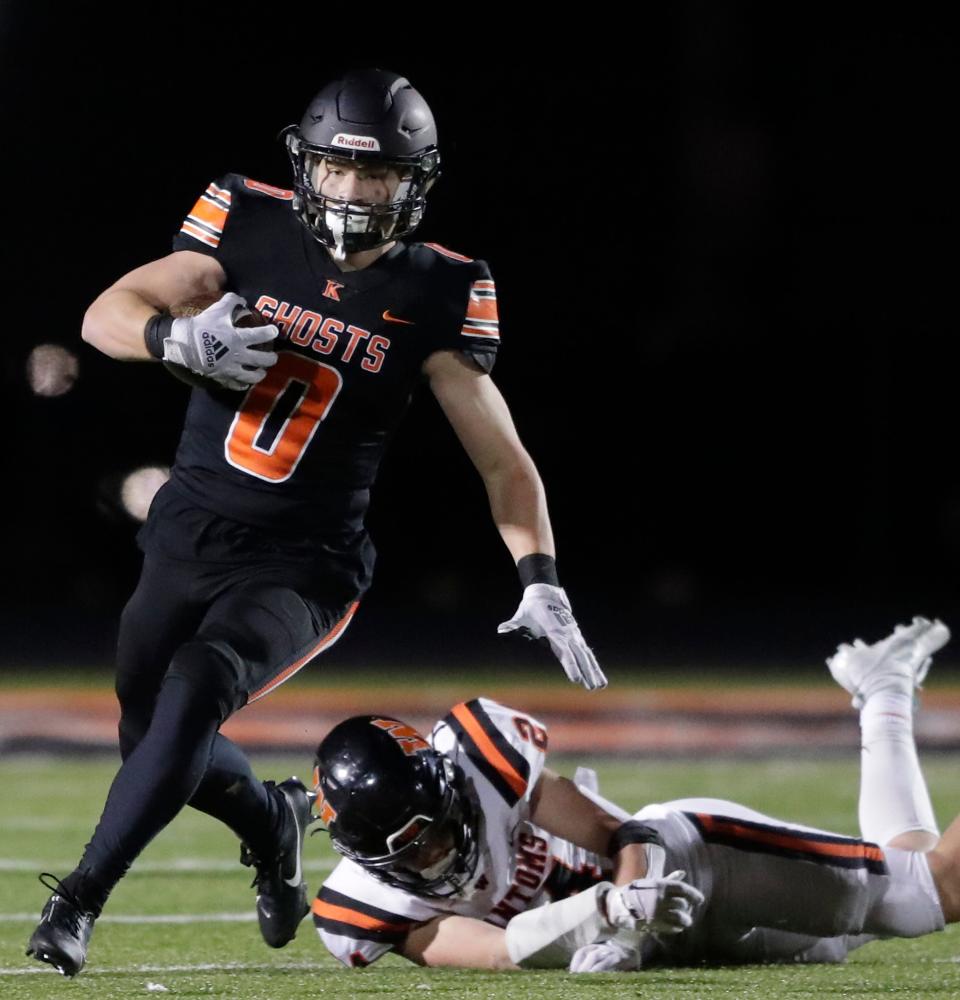 Kaukauna's Connor Kincheloe breaks away from West De Pere's Collin Jindra during Friday's WIAA Division 2 second-round playoff game in Kaukauna. Kaukauna beat West De Pere 13-7.