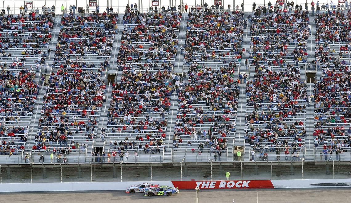 This Feb. 22, 2004 file photo, shows a sparse crowd during the Subway 400 NASCAR Nextel Cup race at North Carolina Speedway near Rockingham, N.C. NASCAR made its official return to Rockingham on Sunday, April 15, 2012, when the Trucks Series races around the beloved mile-long flat oval. It will be the first NASCAR-sanctioned event since 2004, when a long-term realignment plan led NASCAR to abandon its grass-roots tracks in favor of building up bigger markets such as California, Chicago and Kansas City.