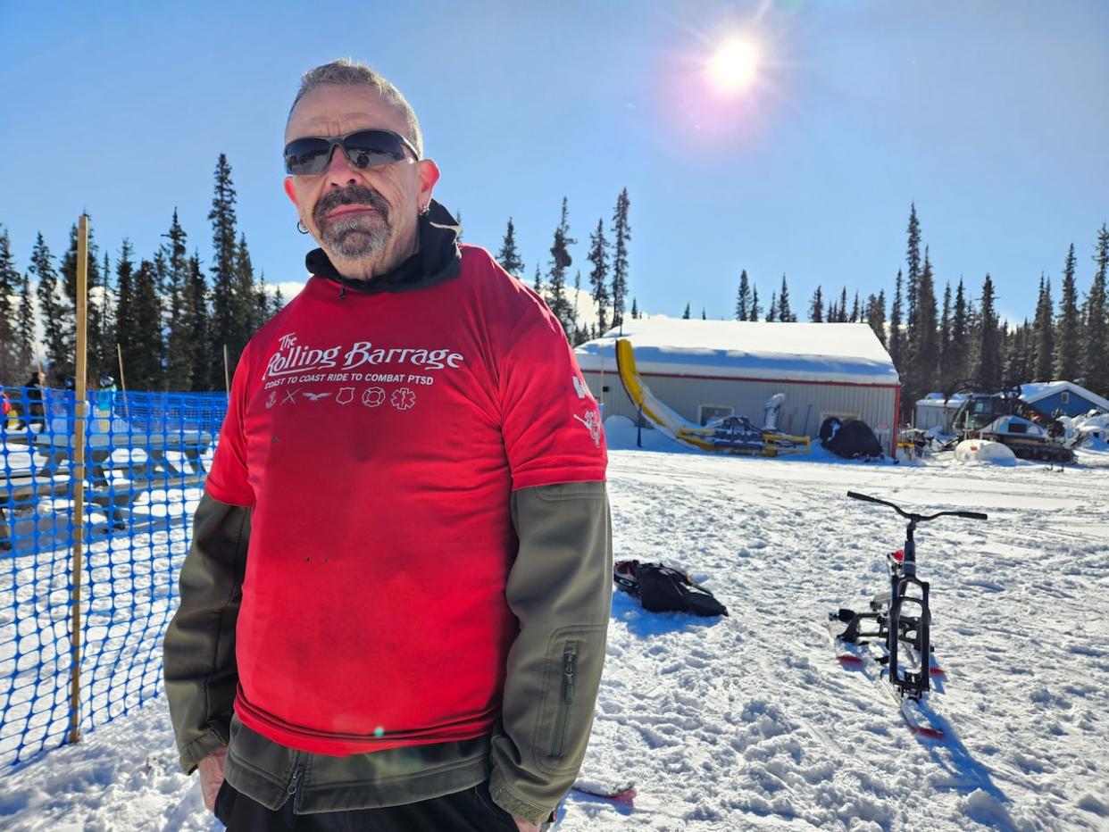 Yance Sheehan, a veteran, used a snow bike during his time at Mount Sima. (Asad Chishti/CBC - image credit)