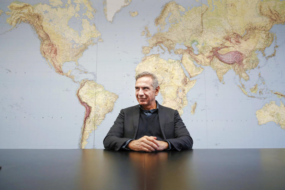 FILE - Italian Fashion Chamber President Carlo Capasa poses at the end of the Associated Press interview in Milan, Italy, on Dec. 19, 2019. Capasa told AP that he regretted Stella Jean's decision to withdraw from this Month's Fashion Week, adding that the final fashion week calendar being presented Wednesday Feb. 8, 2023 is “full of diversity.” (AP Photo/Antonio Calanni, File)