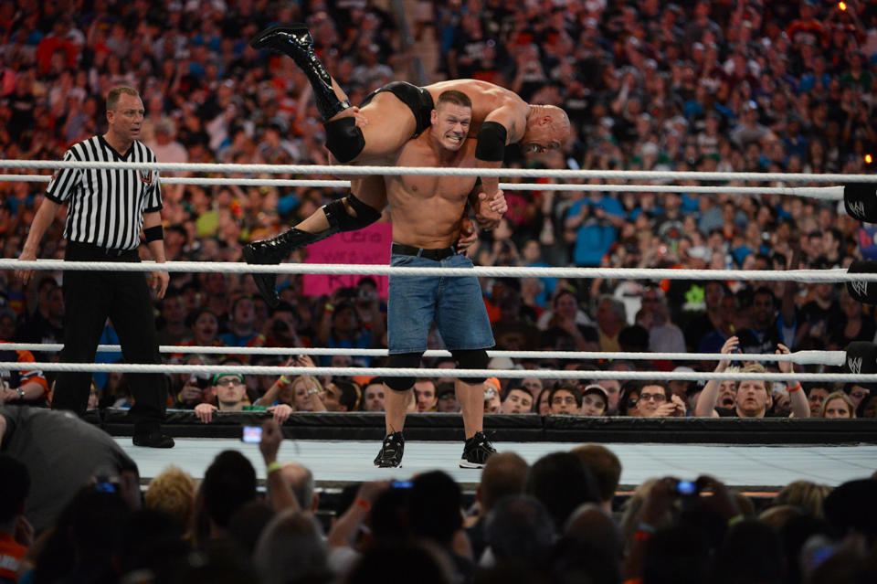 John Cena slams 'The Rock' during WrestleMania XXVIII.