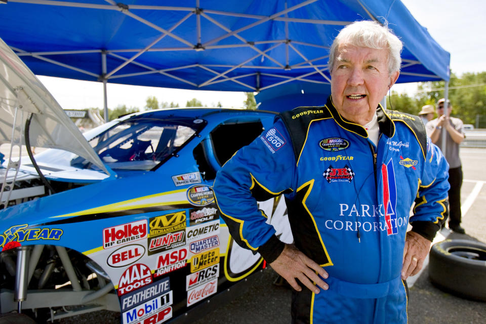 FILE - In this Saturday, July 18, 2009, file photo, Hershel McGriff stands next to his car at Portland International Raceway in Portland, Ore. McGriff is a contender for NASCAR's 2021 Hall of Fame class, to be announced Tuesday, June 16, 2020. (Ross William Hamilton/The Oregonian via AP, File)