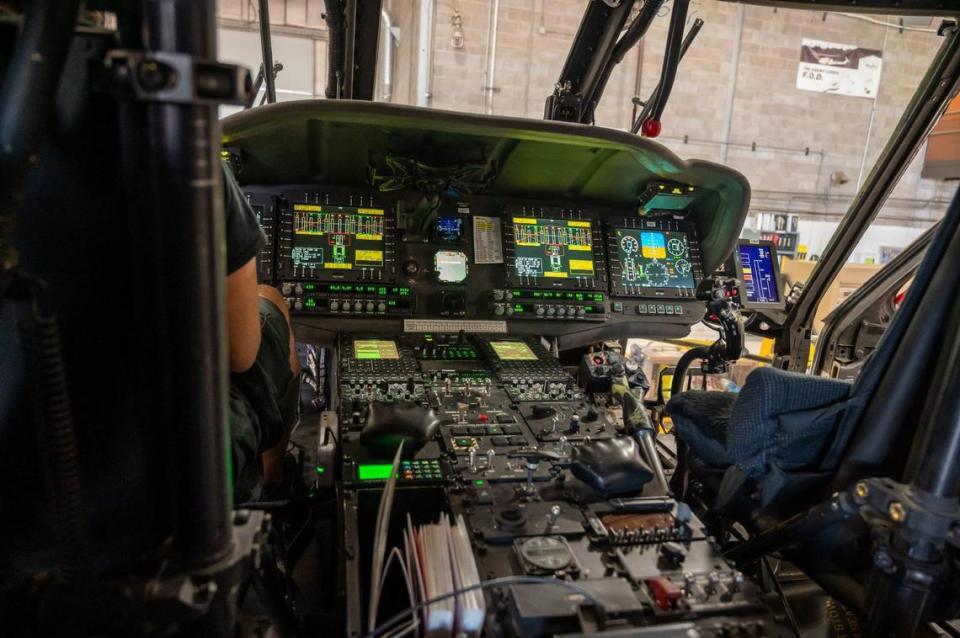 Mechanic tests Cal Fire Hawk firefighting helicopter flight controls at Cal Fire McClellan Reload Base in McClellan on June 25.