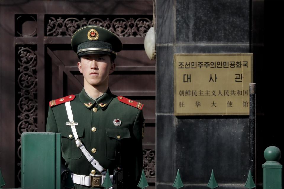 A Chinese paramilitary policeman stands guard outside the North Korea Embassy in Beijing, Tuesday, Feb. 28, 2017. A top North Korean diplomat is visiting Beijing in the wake of China's ban on coal imports from its neighbor and the assassination of North Korean leader Kim Jong Un's older half-brother in Malaysia. (AP Photo/Andy Wong)