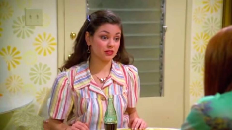 Mila Kunis as Jackie Burkhart in That '70s Show