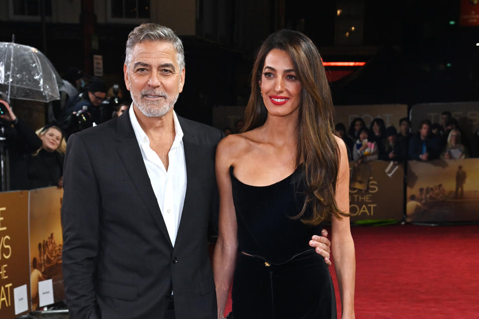 LONDON, ENGLAND - DECEMBER 03: George Clooney and Amal Clooney attend a special screening of 