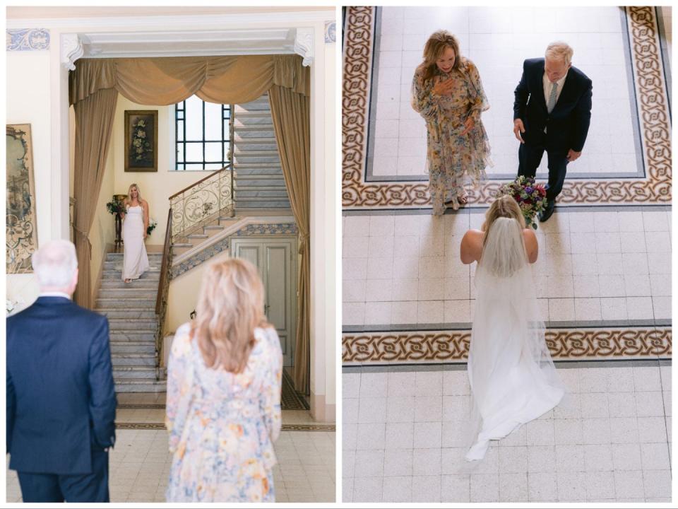 A bride walking towards her parents.