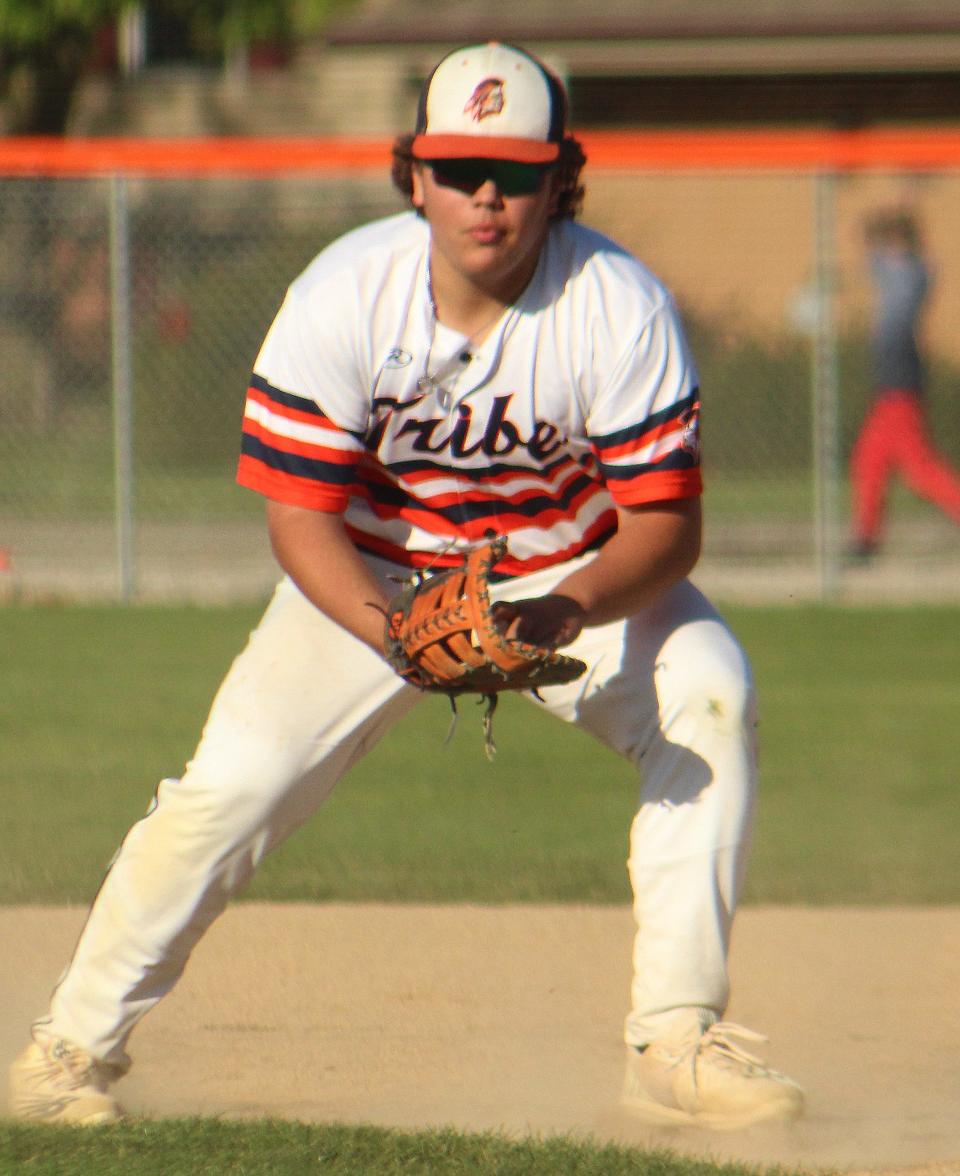 Pontiac first baseman Zayn Eilts makes a move to to the bag for an out after fielding a grounder against Paxton-Buckley-Loda Thursday.