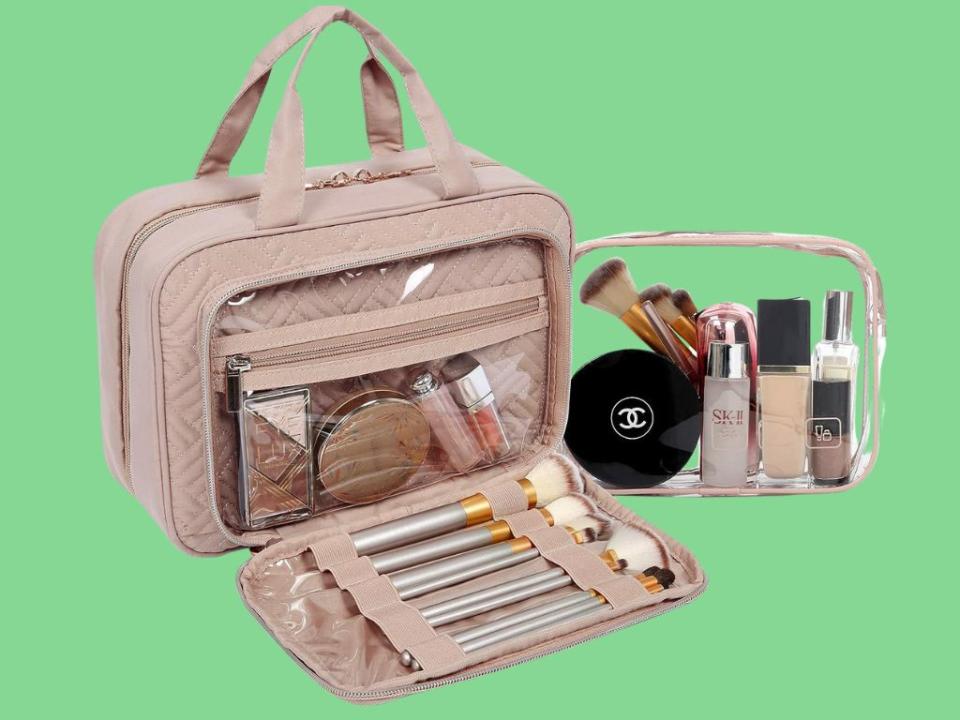 travel toiletry bag with makeup inside and clear zip bag next to it with more makeup