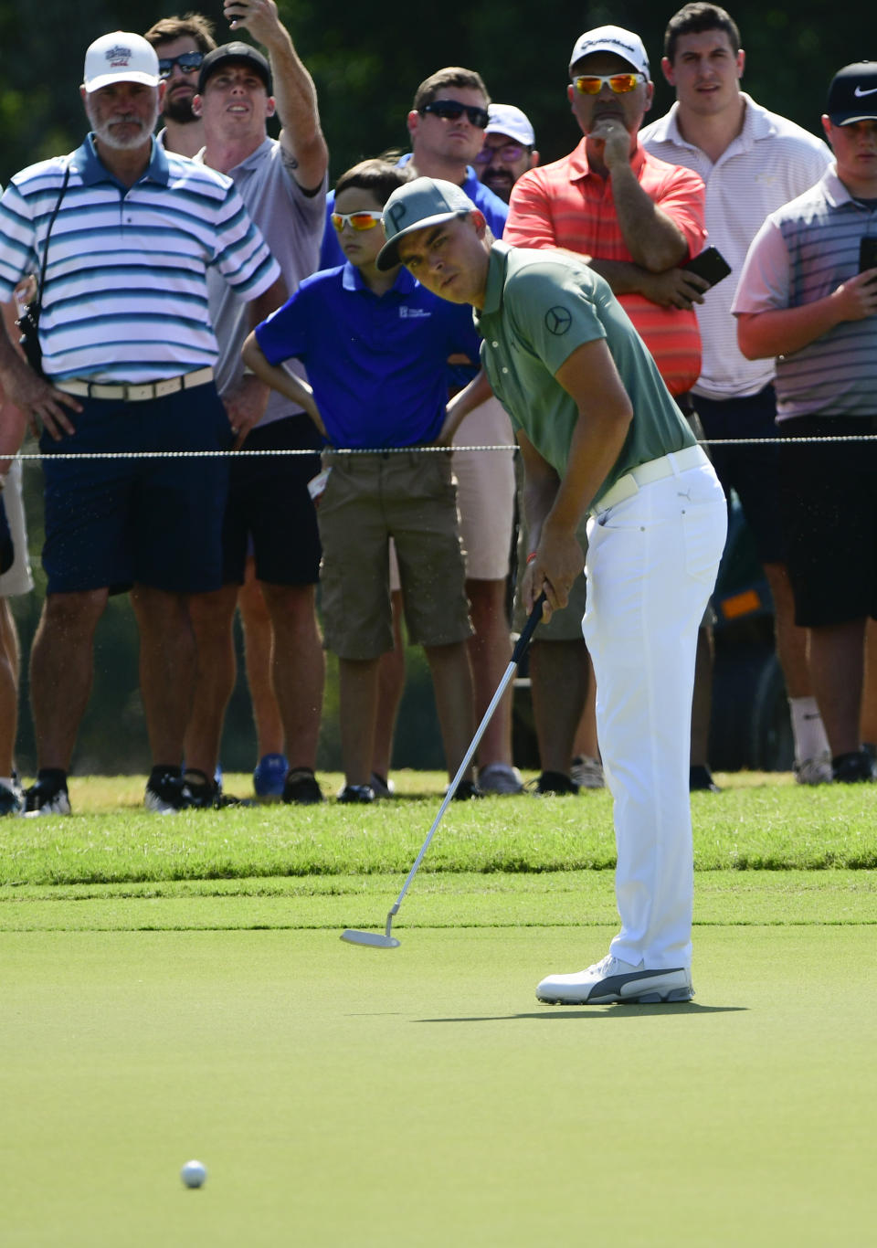 Rickie Fowler misses a putt for birdie on the second hole during the first round of the Tour Championship golf tournament Thursday, Sept. 20, 2018, in Atlanta. (AP Photo/John Amis)